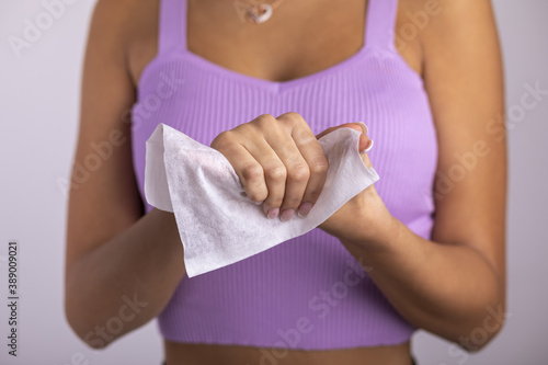 Cleaning hands with wet wipes - prevention of infectious diseases photo