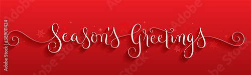 SEASON'S GREETINGS white brush calligraphy with spiral swashes and snowflakes on red background