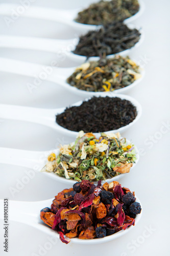 Assortment of dry tea. Various kinds of tea isolated on white.Different kinds of tea leaves. Tea composition with different kind of tea. Tea concept. Tea leaves