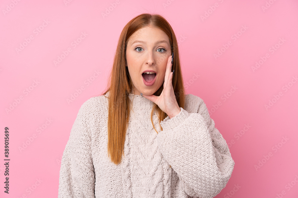 Young redhead woman over isolated pink background with surprise and shocked facial expression Young redhead woman over isolated pink background with surprise and shocked facial expression