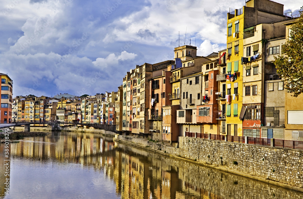 Cramped buildings lining a European canal