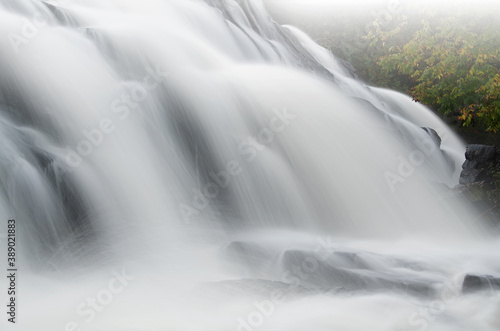 Landscape of Bond Falls in fog captured with motion blur  Ottawa National Forest  Michigan   s Upper Peninsula  USA