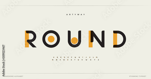 Round modern alphabet. Dropped stunning font, type for futuristic logo, headline, creative lettering and maxi typography. Minimal style letters with yellow spot. Vector typographic design photo
