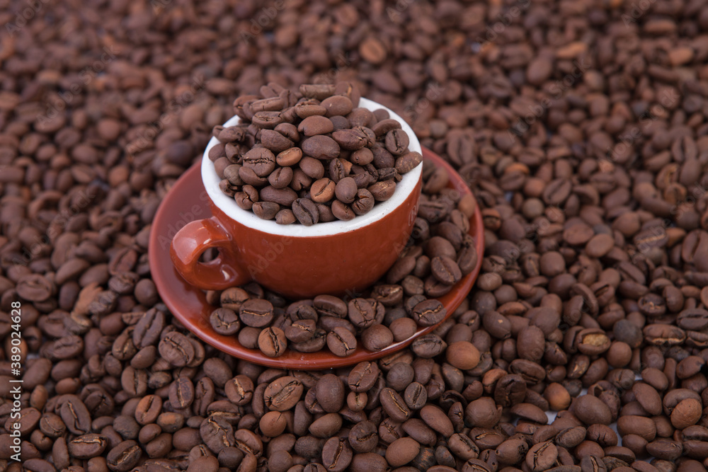 Cup of coffee on the coffee beans background Cup of coffee on the coffee beans background