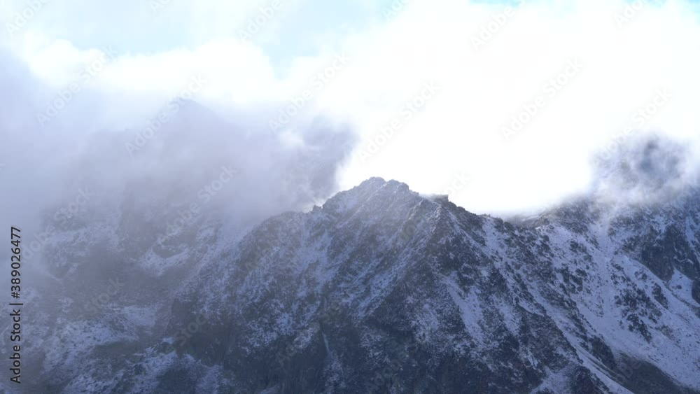Rocky mountain ridge covered with snow Rocky mountain ridge covered with snow