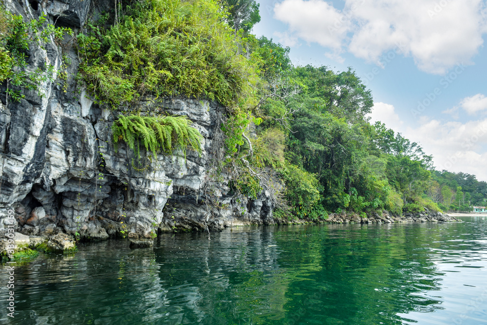 The volcanic rock of the caldera lake is so beautiful, one of the tourist destinations in Indonesia.