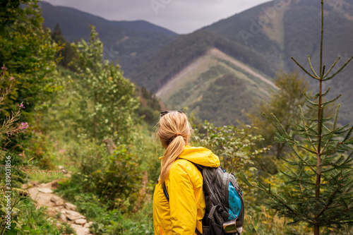 Hiking woman looking at mountain