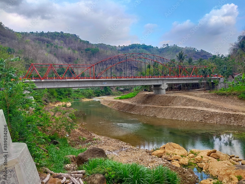 Obraz premium bridge over the river in autumn