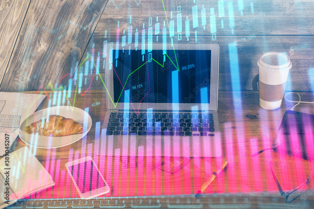 Multi exposure of chart and financial info and work space with computer background. Concept of international online trading. Multi exposure of chart and financial info and work space with computer background. Concept of international online trading.