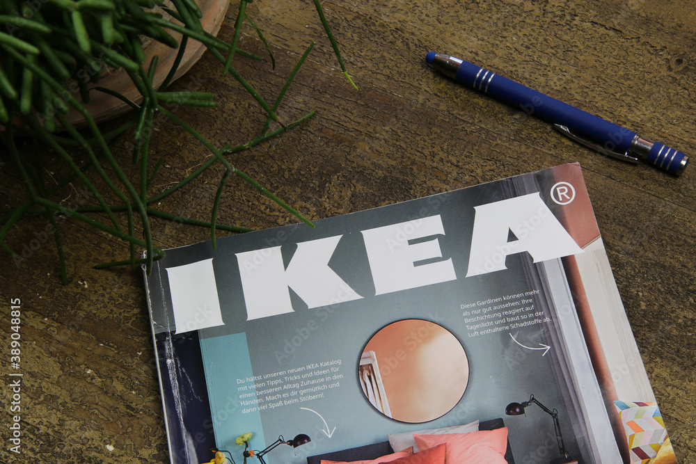 Viersen, Germany - August 18. 2020: View on isolated Ikea catalog on wood  table with pencil and plant (focus on catalog cover) Stock Photo | Adobe  Stock
