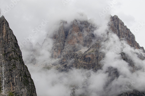 Dolomites, Brenta. Beautiful foggy day in cold summer day in Moveno, Italy