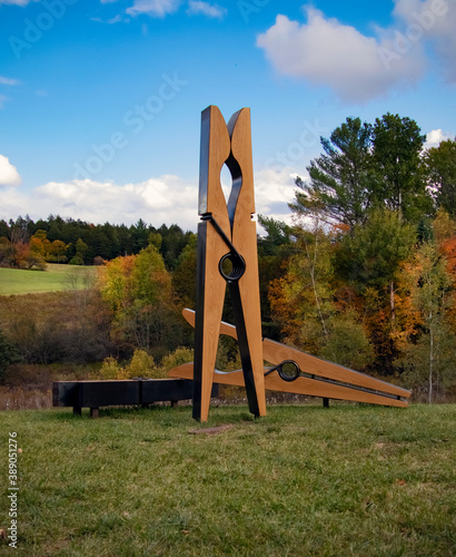 Art sculpture in front of New England landscape photo