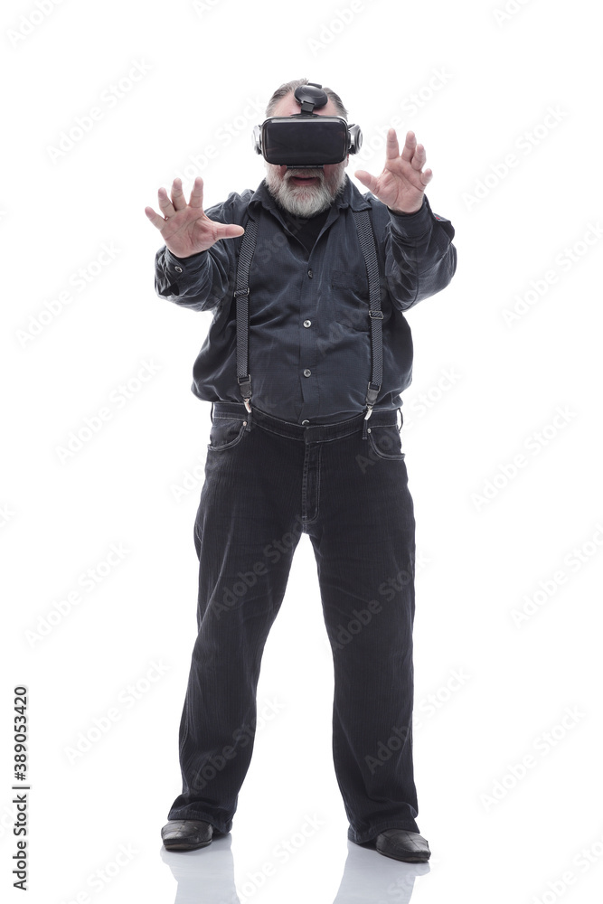 modern adult male in a virtual reality helmet. isolated on a white modern adult male in a virtual reality helmet. isolated on a white