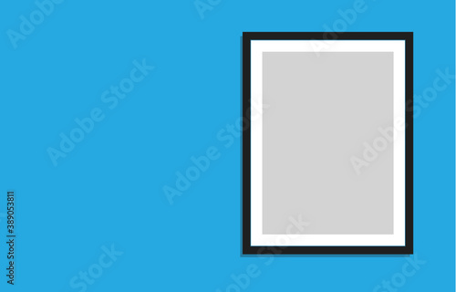 Blank Picture Frame with Room for Copy on a Bright Blue Wall