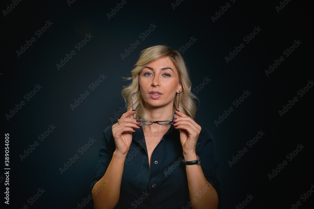 Beautiful young blonde woman with blue eyes isolated on back Beautiful young blonde woman with blue eyes isolated on back
