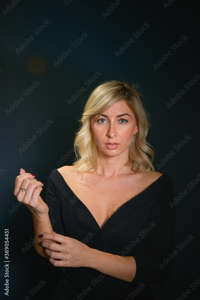 Beautiful young blonde woman with blue eyes isolated on back Beautiful young blonde woman with blue eyes isolated on back