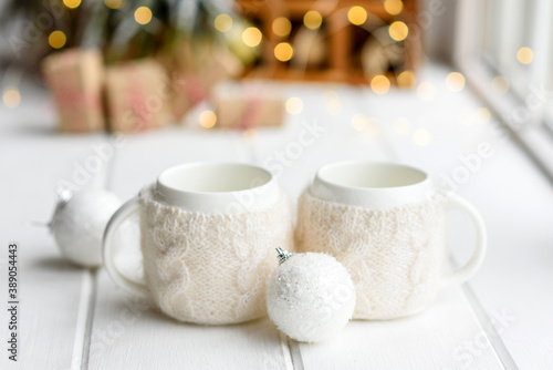 Wallpaper Mural Beautiful multi-colored Christmas decorations on a light wooden table Torontodigital.ca