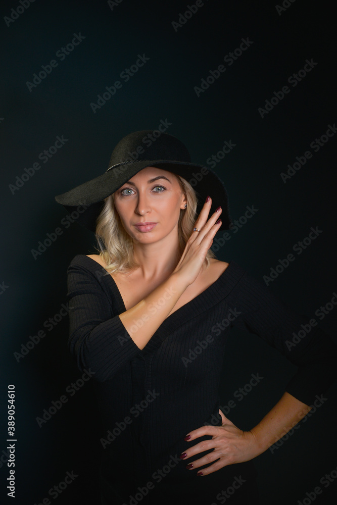 Beautiful young blonde woman with blue eyes isolated on back Beautiful young blonde woman with blue eyes isolated on back