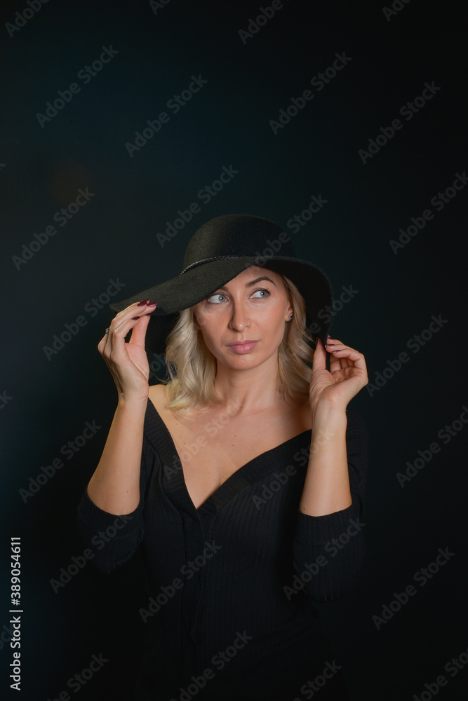 Beautiful young blonde woman with blue eyes isolated on back Beautiful young blonde woman with blue eyes isolated on back