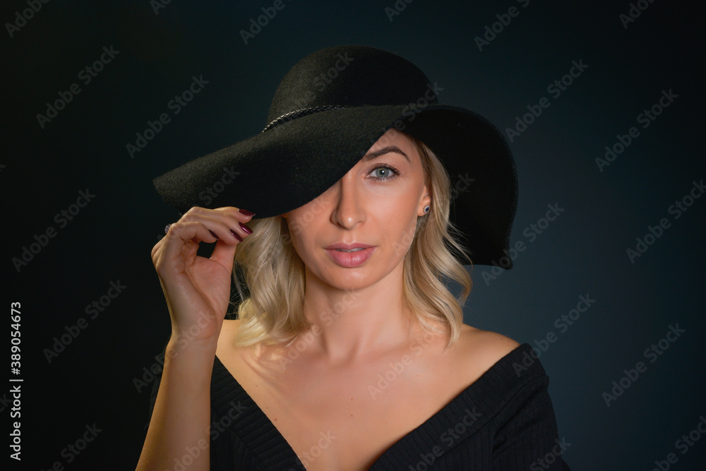 Beautiful young blonde woman with blue eyes isolated on back Beautiful young blonde woman with blue eyes isolated on back