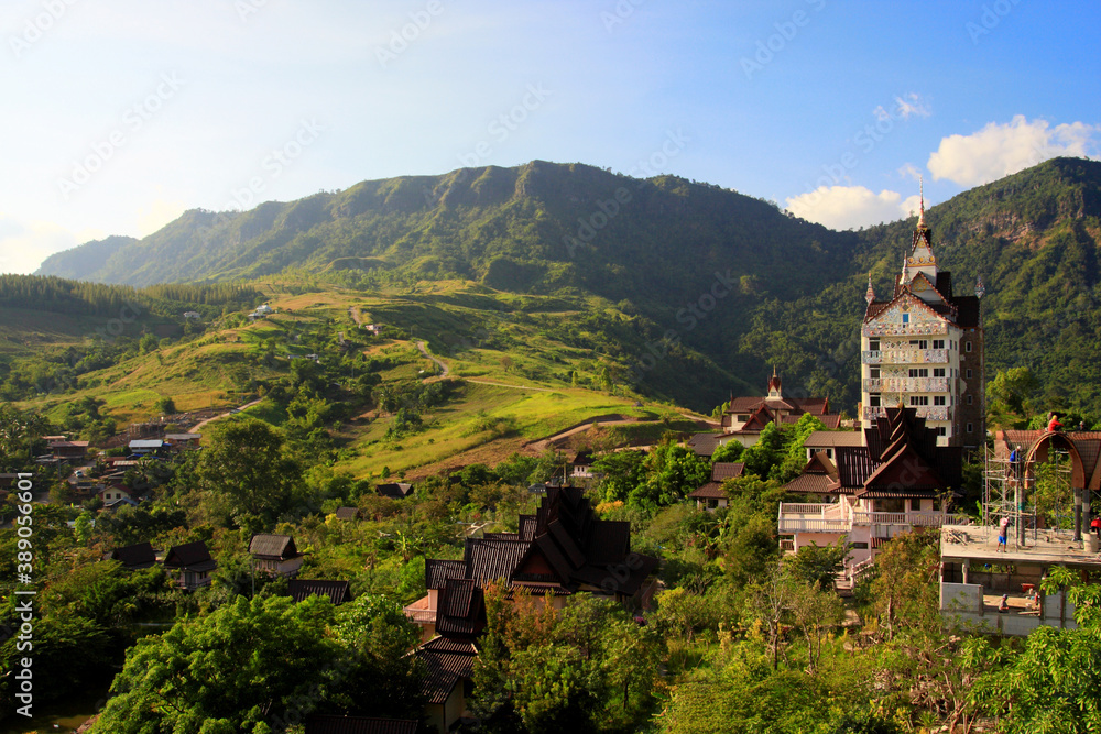 landscape view of building in the mountains