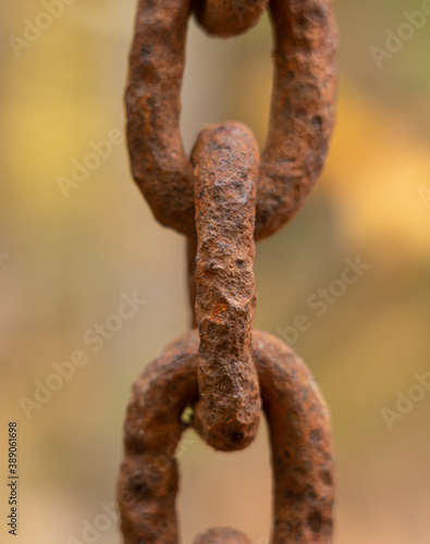 Closeup of rusty chain links © Mark