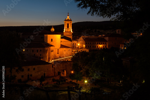 City landscape of Santo Domingo de Silos with the famous Monastery of Silos illuminated at sunset, Burgos, Spain © JMDuran Photography