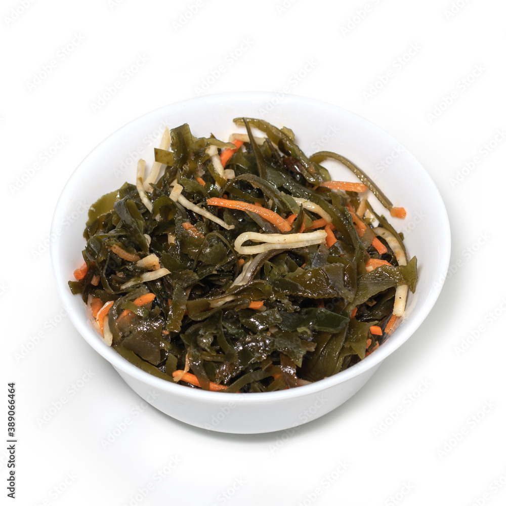 Seaweed salad with sesame seeds isloated on white Seaweed salad with sesame seeds isloated on white