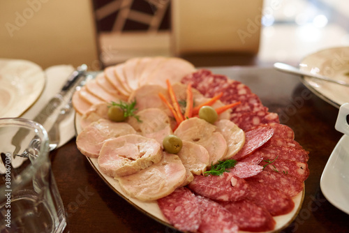 Lunch meats are precooked or cured ones that are sliced and served cold or hot