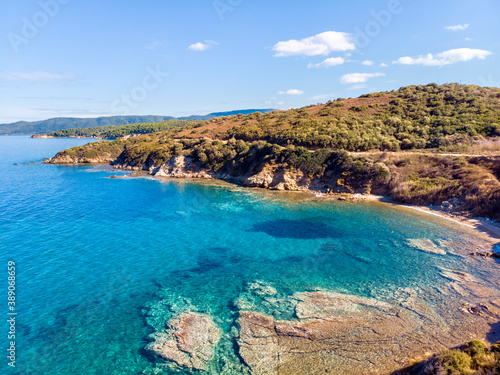 Sea with beach and mountains in Nea Roda, Halkidiki, Greece