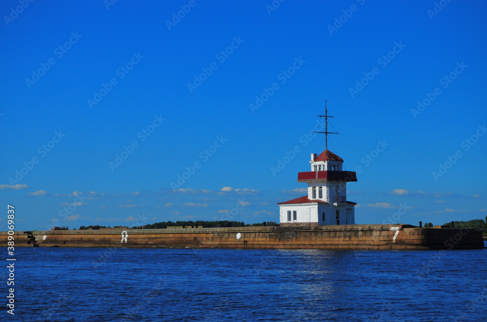 Lighthouse in the Gulf of Finland off the coast of Kotlin. Russia Saint Petersburg 08/17/2020 Lighthouse in the Gulf of Finland off the coast of Kotlin. Russia Saint Petersburg 08/17/2020