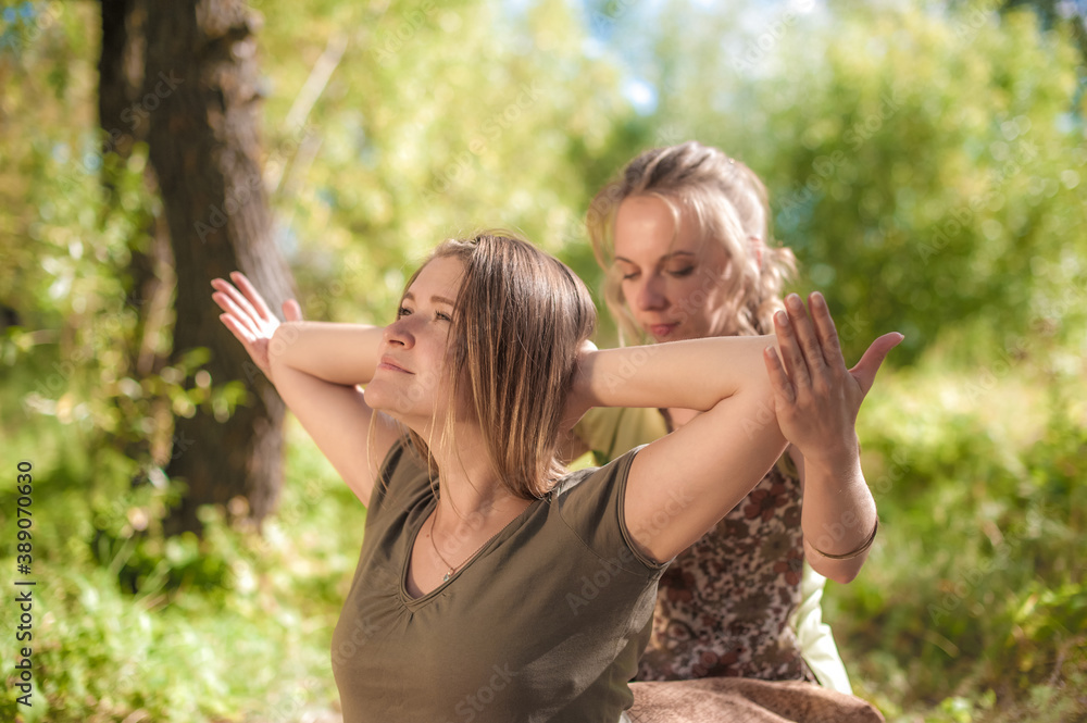 Young fair-haired beautiful girl doing massage. Young fair-haired beautiful girl doing massage.