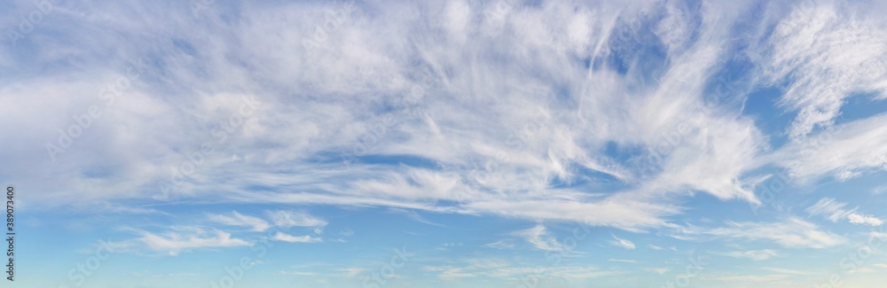 Bright sky background with cirrus clouds above, high resolution image
