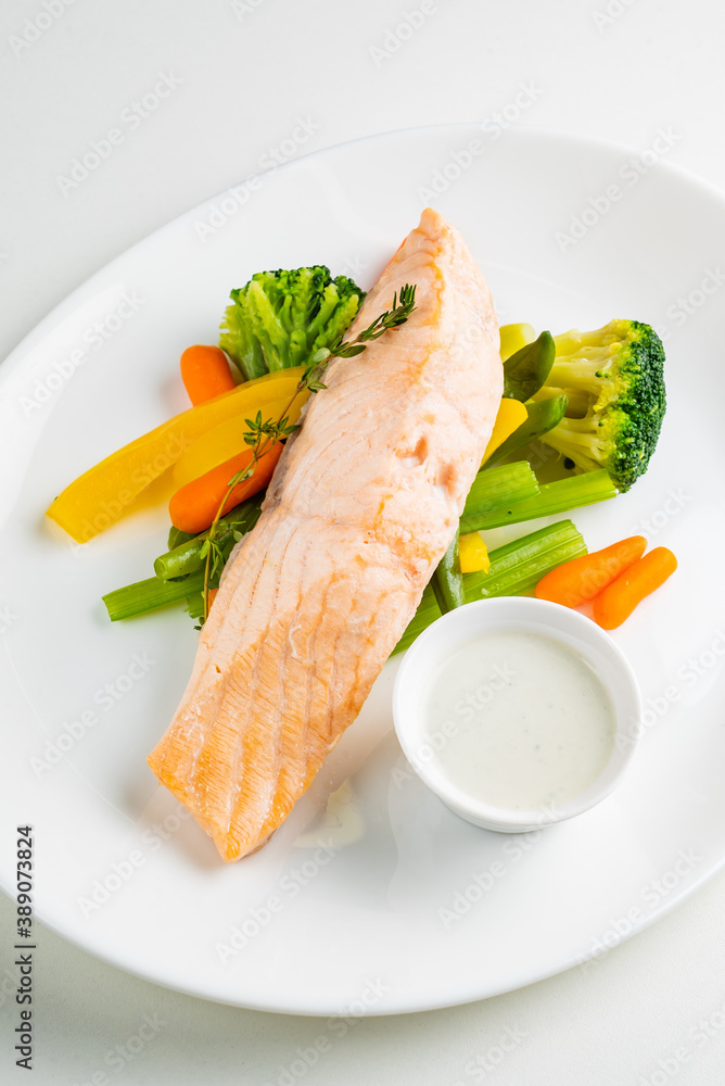 Fillet of salmon with cooked vegetables Fillet of salmon with cooked vegetables