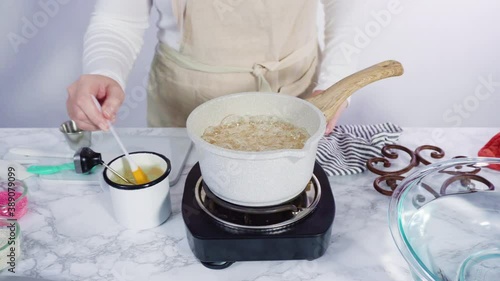 Wallpaper Mural Step by step. Caramelizing sugar in a small cooking pot over the small electric stove. Torontodigital.ca