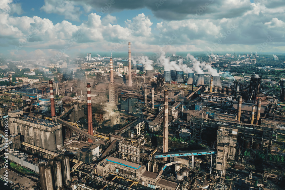 Oil industry. Aerial view of Petrochemical industrial factory, heavy industry, refinery production with smoke pollution. Oil industry. Aerial view of Petrochemical industrial factory, heavy industry, refinery production with smoke pollution.