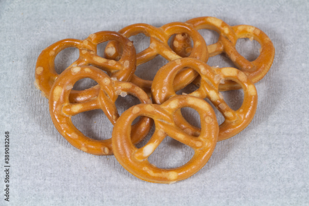 Bretzel biscuits for appetizer on gray background Bretzel biscuits for appetizer on gray background