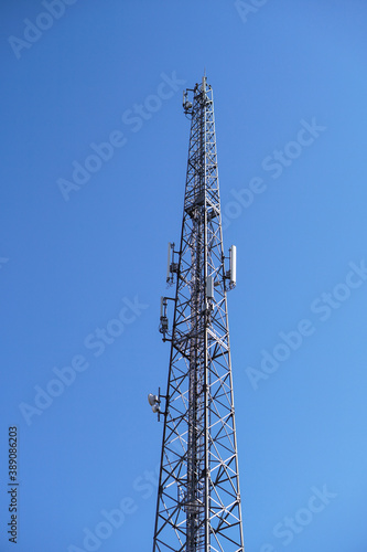 Telephone station transmitting gsm mobile signal. Tower transmitting 5g, 4g internet around the world. Pollution of the natural environment