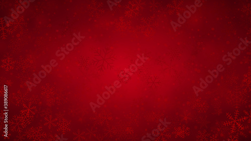 Christmas background of snowflakes of different shapes, sizes and transparency in red colors