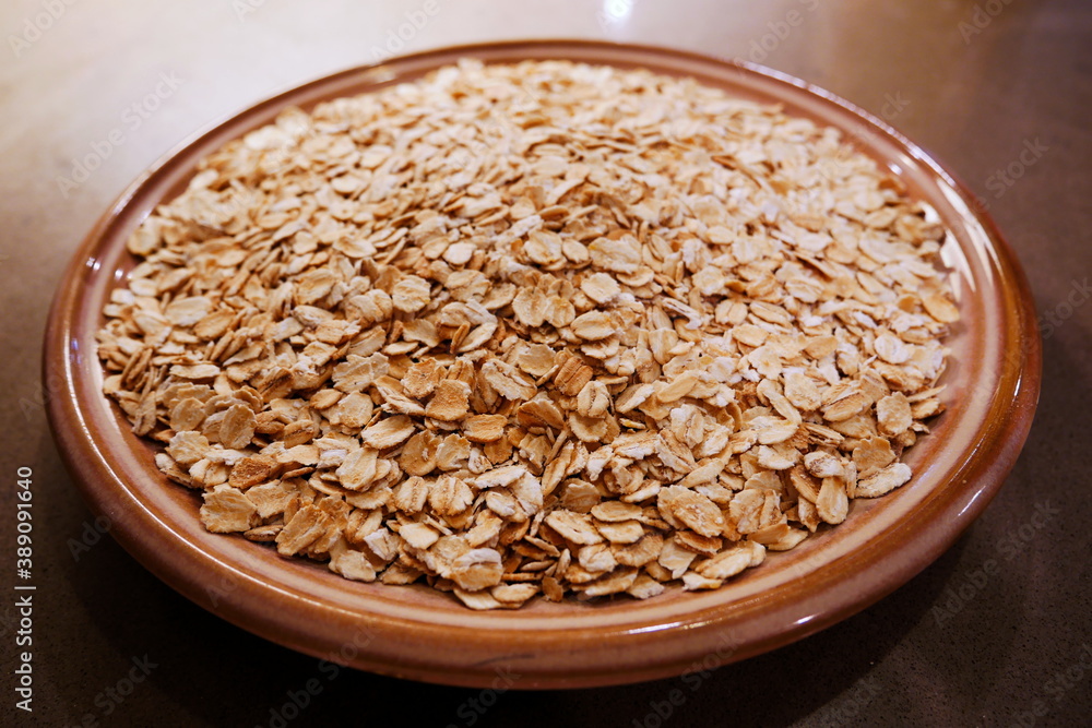 Bowl of oats on a kitchen surface Bowl of oats on a kitchen surface
