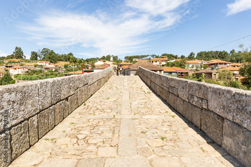 medieval bridge over Varosa river in Ucanha village, municipality of Tarouca, district of Viseu, Portugal