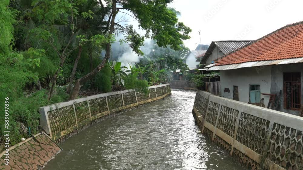 Indonesian village with a river Indonesian village with a river