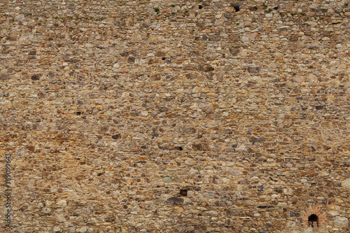 Large size medieval brown stone wall texture