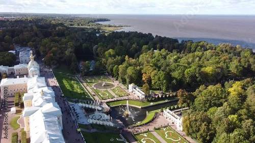 Aerial view of Peterhof Palace, with the gardens, parks, water fountains and water canals in the background, St Petersburg, Russia