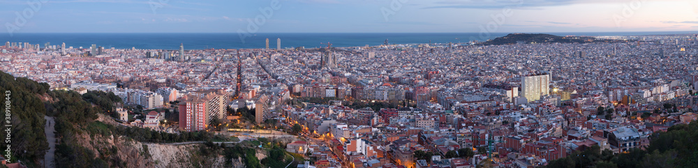 Barcelona - The panorama of the city with the at the dusk.