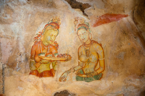 Sigiriya frescoes mural paintings sheltered gallery on Sigiriya rock fortress, Sri Lanka.