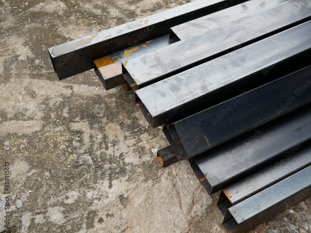 Obraz premium pile of metal rods at construction site,metal construction.