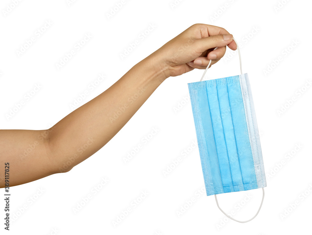 hand holds a medical face mask against viruses and bacteria on a white background, hand holds a medical face mask against viruses and bacteria on a white background,