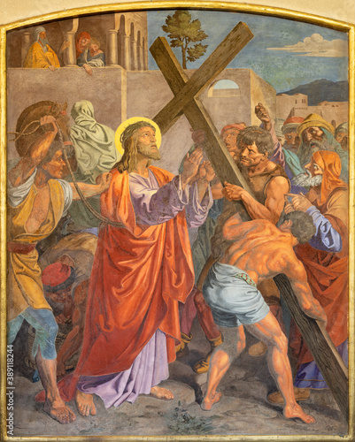 VIENNA, AUSTIRA - OCTOBER 22, 2020: The fresco Jesus carries his cross as part of Cross way station in the church of St. John the Nepomuk by Josef Furlich (1844 - 1846).