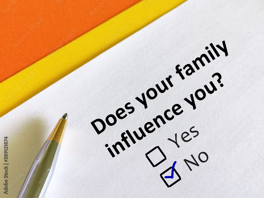 One person is answering question about family. The person is thinking if his family influence him. One person is answering question about family. The person is thinking if his family influence him.
